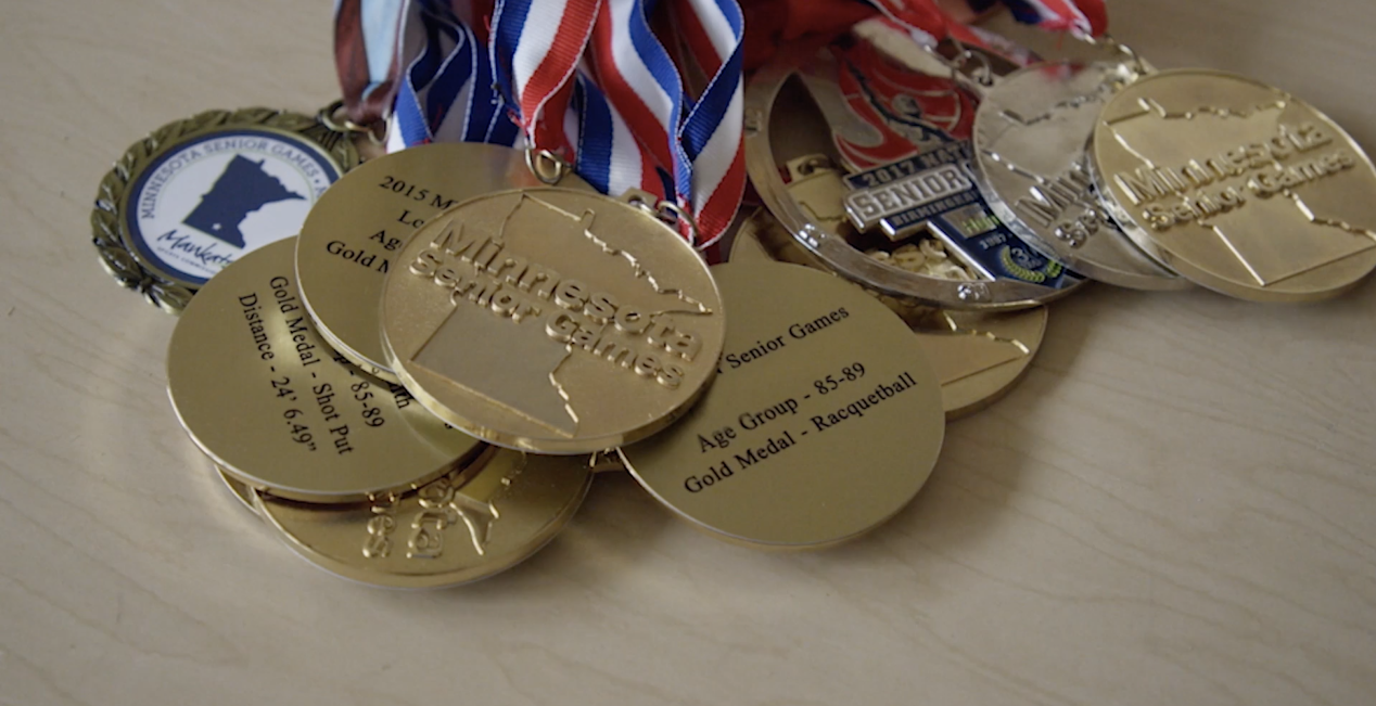 Gold medals displayed. Play video
